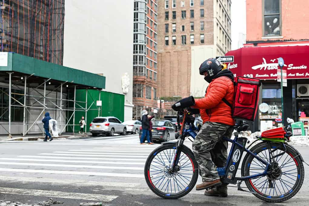 Delivery driver on a bike in New York